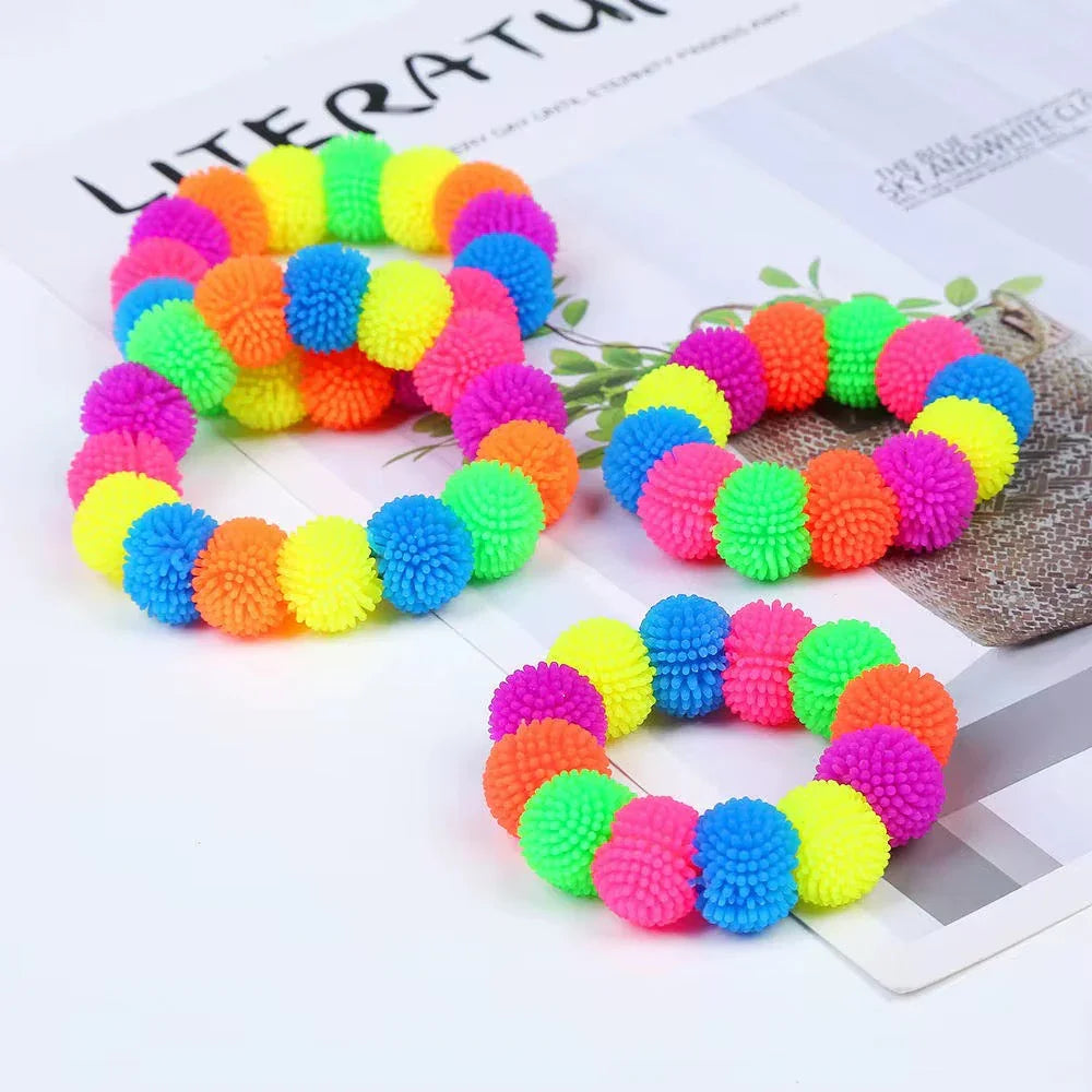 rainbow-colored tactile sensory bracelet.